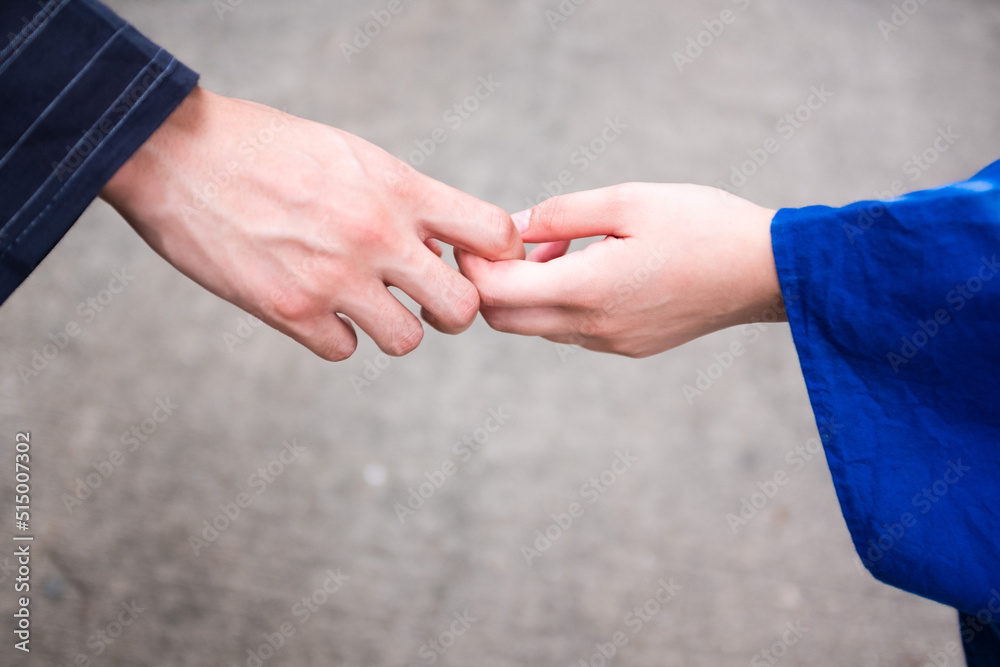 couple holding hands together couple holding hands together
