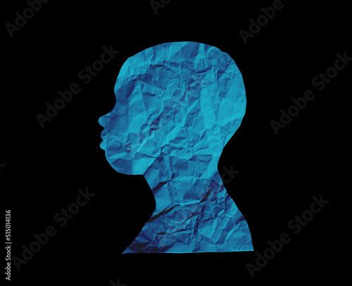 Human head silhouette with black background. People portrait with crumpled paper texture. Paper cut people from side angle.