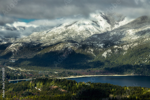 Landscape with mountains, lake and snow