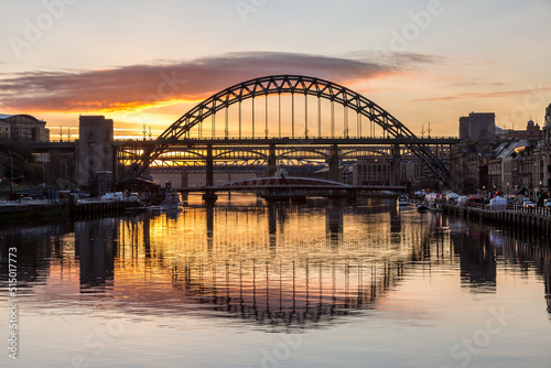 The Tyne Bridge in Newcastle at sunset, reflecting in the almost still River Tyne beneath © Paul Jackson