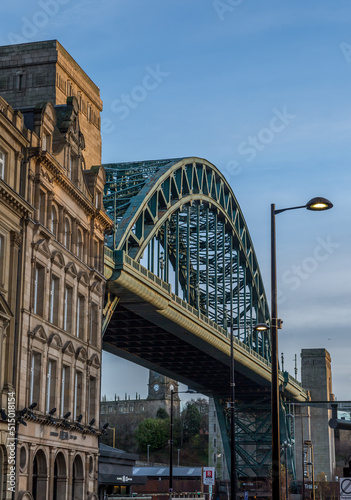 The Tyne Bridge during the Blue hour, surrounded by the beautiful architecture of Newcastle, England