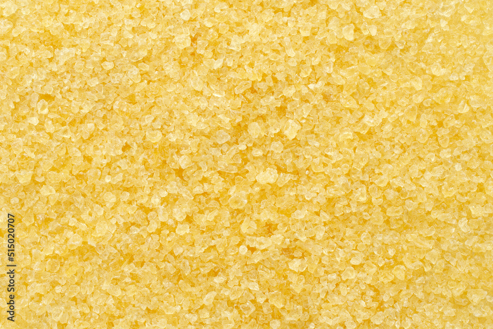 Fotografia do Stock Gelatin, yellow powder top view. Background