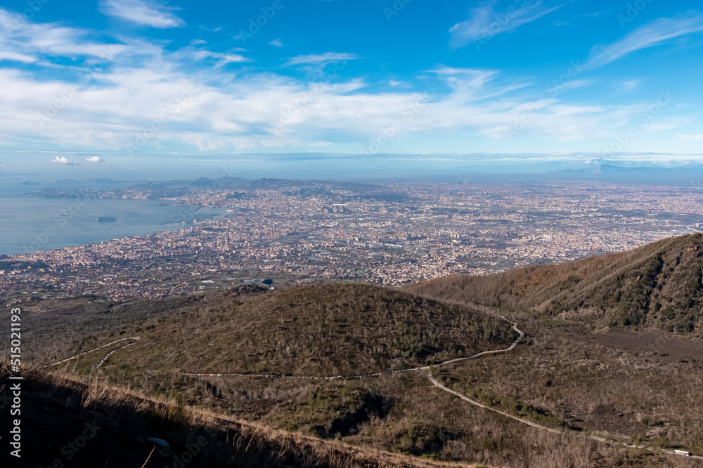 Panoramic view from volcano Mount Vesuvius on the bay of Naples, Province of Naples, Campania region, Italy, Europe, EU. Looking at the city of Naples and Mediterranean coastline on a sunny day.