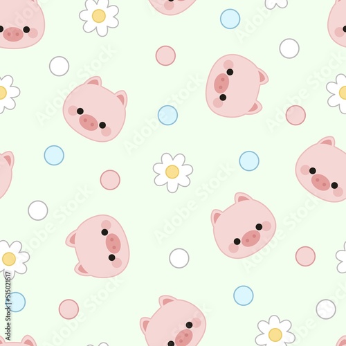 Seamless pattern of piglet faces, flowers and dots on a green background.
