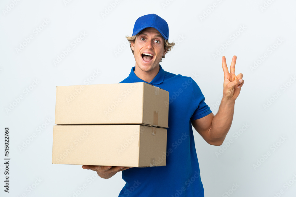 Delivery man over isolated white background smiling and showing victory sign Delivery man over isolated white background smiling and showing victory sign