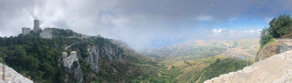 Panorama of the Italian mountains and castles on the Mediterranean.