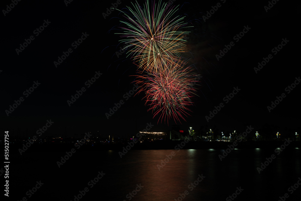Fireworks shoot over Alamitos Bay in Long Beach to celebrate July 4th holiday. Fireworks shoot over Alamitos Bay in Long Beach to celebrate July 4th holiday.