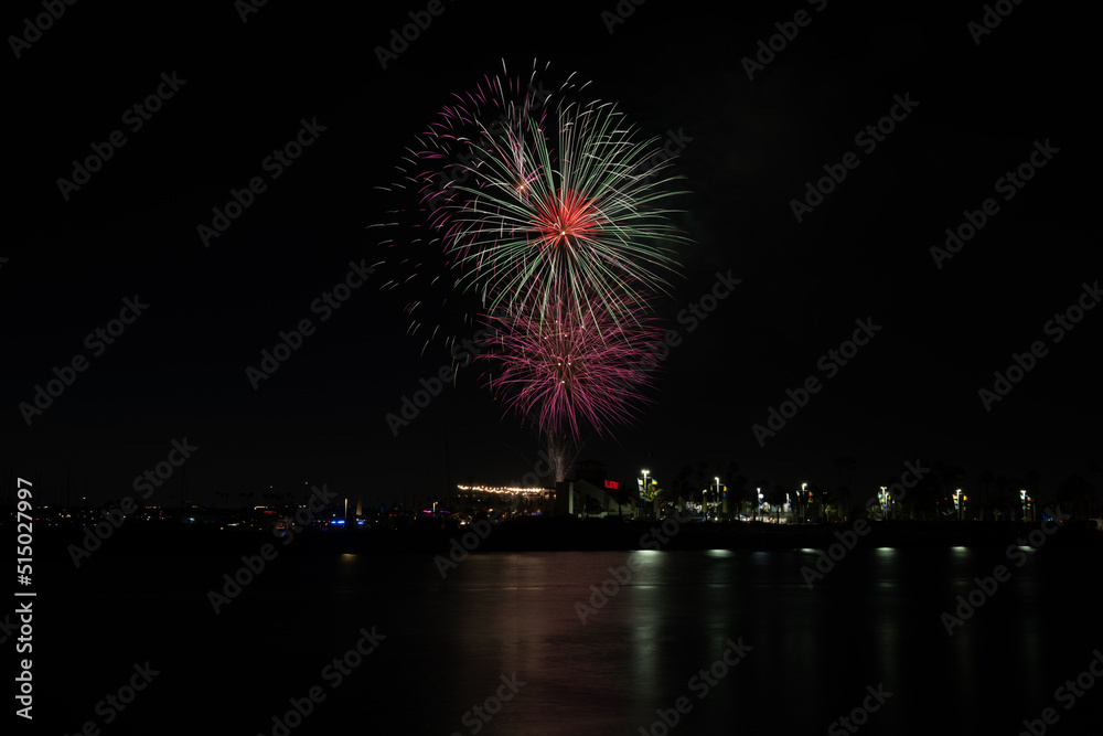 Fireworks shoot over Alamitos Bay in Long Beach to celebrate July 4th holiday. Fireworks shoot over Alamitos Bay in Long Beach to celebrate July 4th holiday.