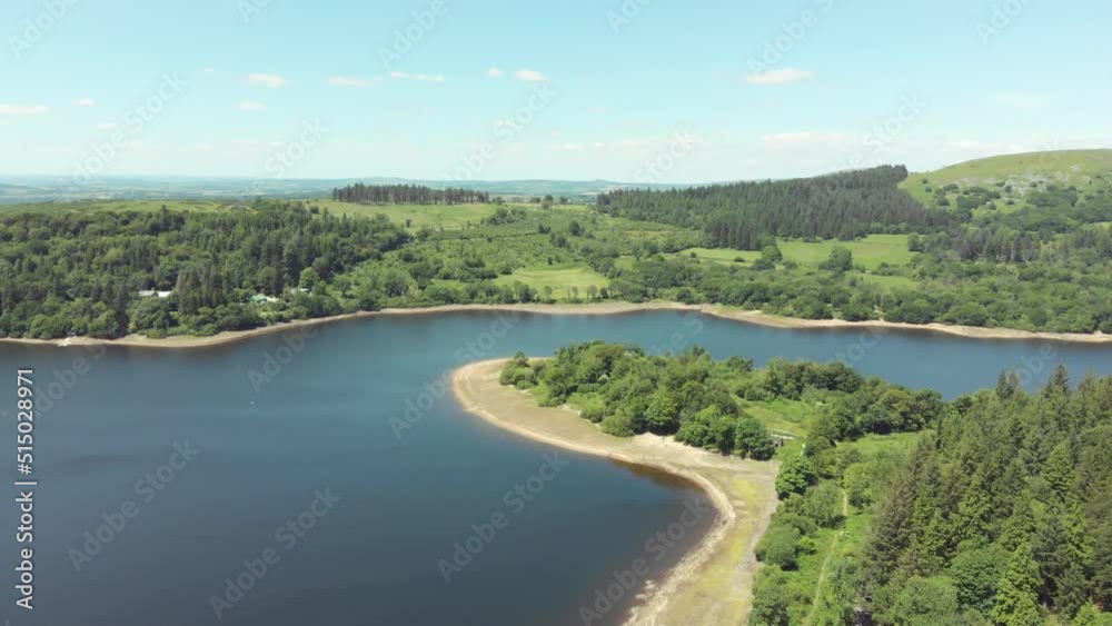 Aerial drone shot of blue lake and green landscapes - Burrator Reservoir, Dartmoor National Park Aerial drone shot of blue lake and green landscapes - Burrator Reservoir, Dartmoor National Park