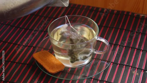 Steam coming from a hot cup of tea inside home