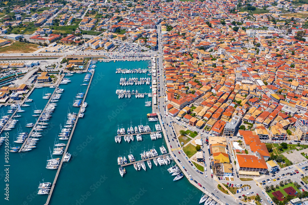 Lefkada, Greece. Aerial view of Lefkada town and marina on the Ionian island. Sailboats in the harbour. Beautiful city on the sea side. Old town. Top view of the marina on coastline. Go Everywhere