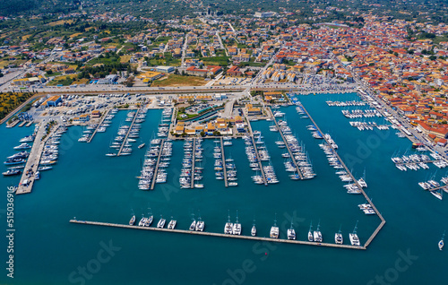 Lefkada, Greece. Aerial view of Lefkada town and marina on the Ionian island. Sailboats in the harbour. Beautiful city on the sea side. Old town. Top view of the marina on coastline. Go Everywhere photo