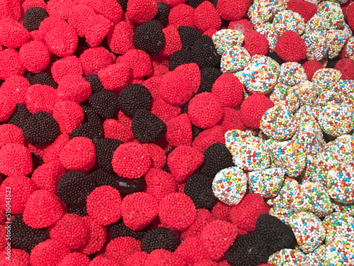 Multicolor jelly berries in sweet-shop, background