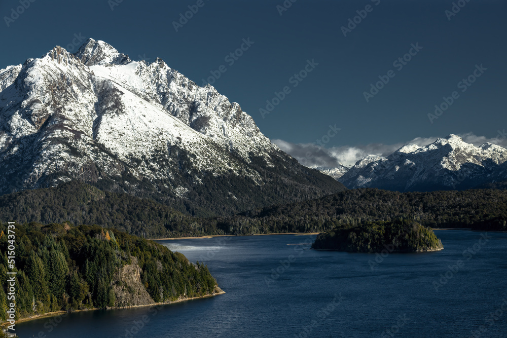 Landscape with snowed mountains and lakes