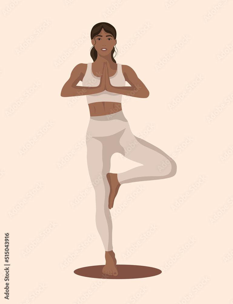 Black woman standing in Tree pose and meditating, practicing Hatha yoga and zen meditation Black woman standing in Tree pose and meditating, practicing Hatha yoga and zen meditation