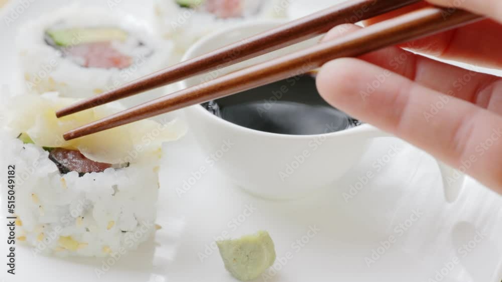 Adding Ginger to Tuna Uramaki Roll Adding Ginger to Tuna Uramaki Roll