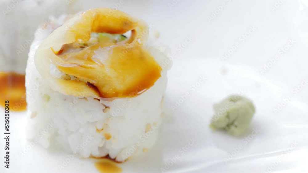 Dripping Soy Sauce on Veggie Roll Dripping Soy Sauce on Veggie Roll