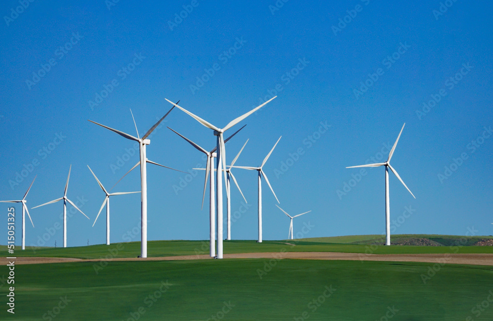 wind turbine on green meadow wind turbine on green meadow