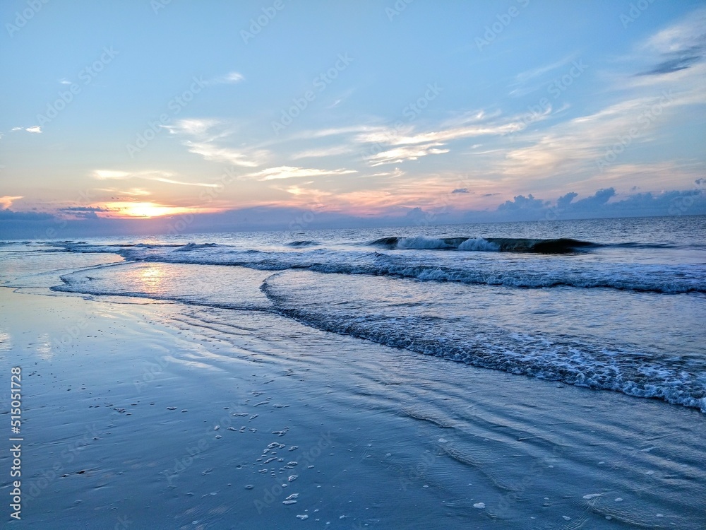 Beach Ocean Sunrise Over Rippling Stacked Waves Beach Ocean Sunrise Over Rippling Stacked Waves