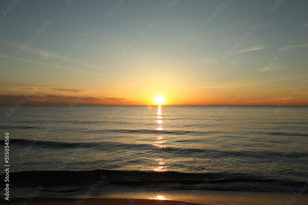 Picturesque view of beautiful sea beach at sunset