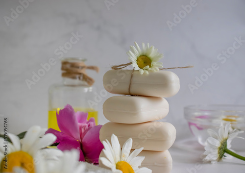 Soap cosmetic flower chamomile  peony on a light background