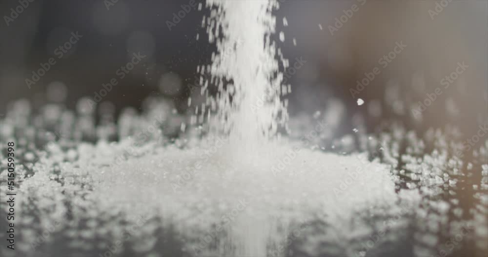 Sugar falls on a mirror surface Sugar falls on a mirror surface