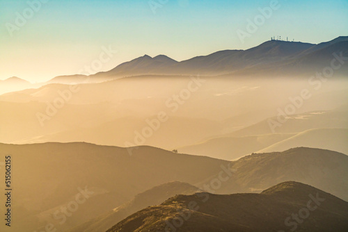 Sunset, sunrise with layers of Mountains, hills