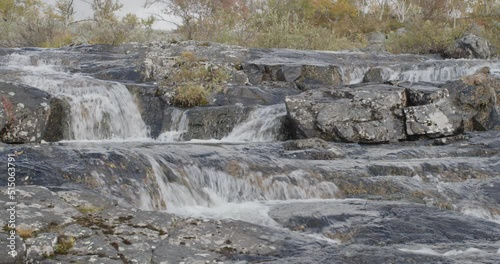 Waterfall Tsahkal in autumn at Enontekiö, Kilpisjärvi, Finland. photo