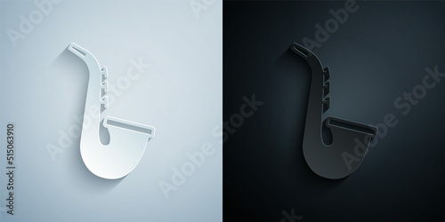 Paper cut Musical instrument saxophone icon isolated on grey and black background. Paper art style. Vector