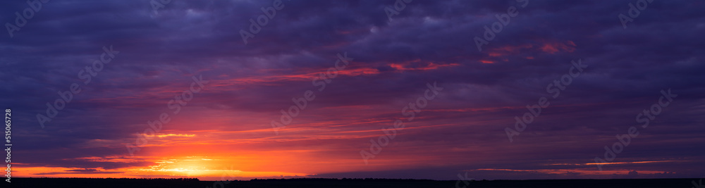 Clouds and orange sunset. Worsening weather conditions. Emergency. Abstract natural background.