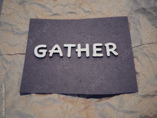Gather in Wood Lettering on Gray and Black Background