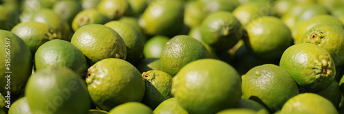 limes, juicy citrus fruits background