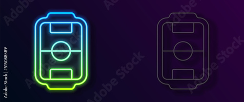 Glowing neon line Table football game hobby or leisure icon isolated on black background. Sport team football players. Vector