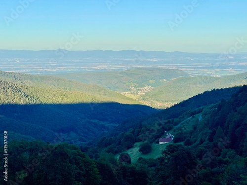 Beautiful mountain landscape in the Florival valley above Guebwiller, with the plain of Alsace, seen from the top on a sunny summer day photo