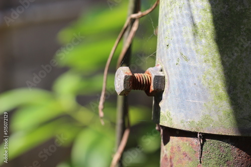 rusty bolts to strengthen the pole