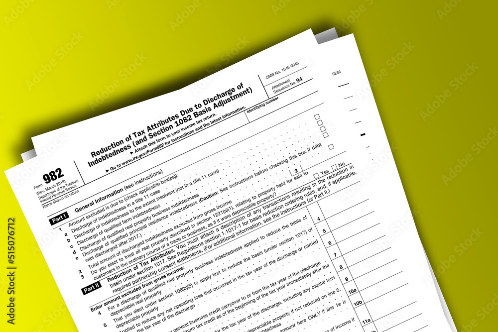 Form 982 documentation published IRS USA 43315. American tax document on colored Form 982 documentation published IRS USA 43315. American tax document on colored
