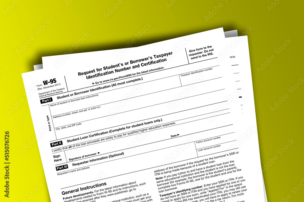 Form W-9S documentation published IRS USA 43081. American tax document on colored Form W-9S documentation published IRS USA 43081. American tax document on colored