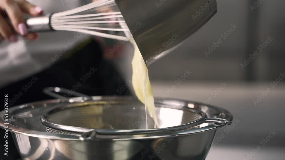 young girl chef makes desserts. bakes sweets and cakes. makes blanks and prepares fruits for the filling. baking, dessert, sweets, complex cooking processes.