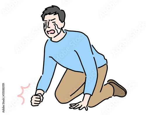 ひざまづいて涙を流して悔しがっている若い男性
