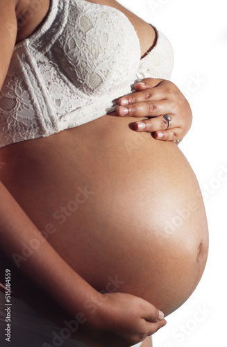 Belly latina pregnant woman on lingeries white background