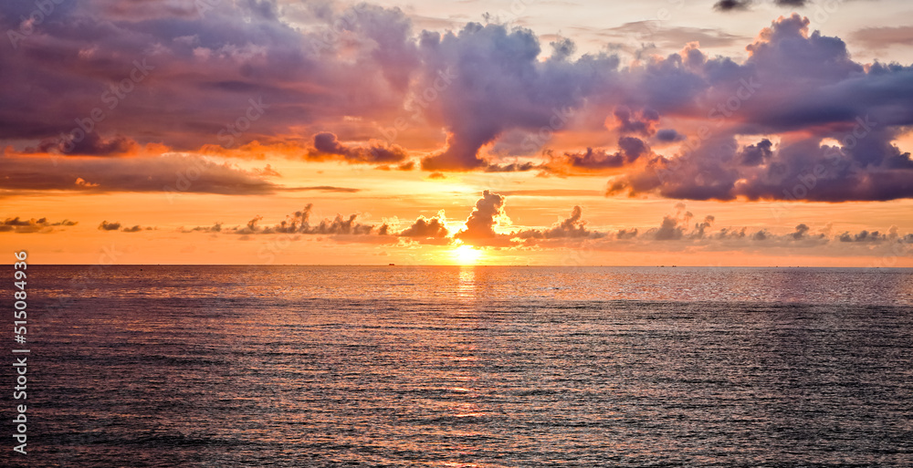 Naklejka premium The beauty of the sunset in the city of Old Menado