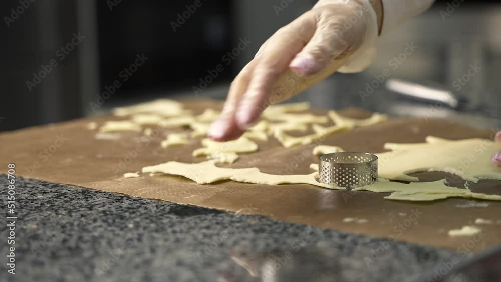 young girl chef makes desserts. bakes sweets and cakes. makes blanks and prepares fruits for the filling. baking, dessert, sweets, complex cooking processes. young girl chef makes desserts. bakes sweets and cakes. makes blanks and prepares fruits for the filling. baking, dessert, sweets, complex cooking processes.