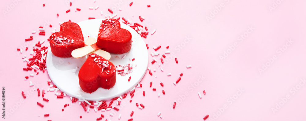 Red strawberry ice-cream on pink background.
