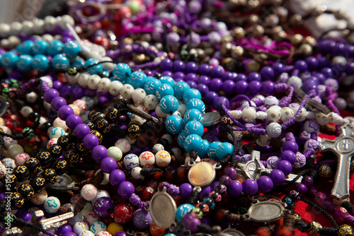 Group of rosaries on table
