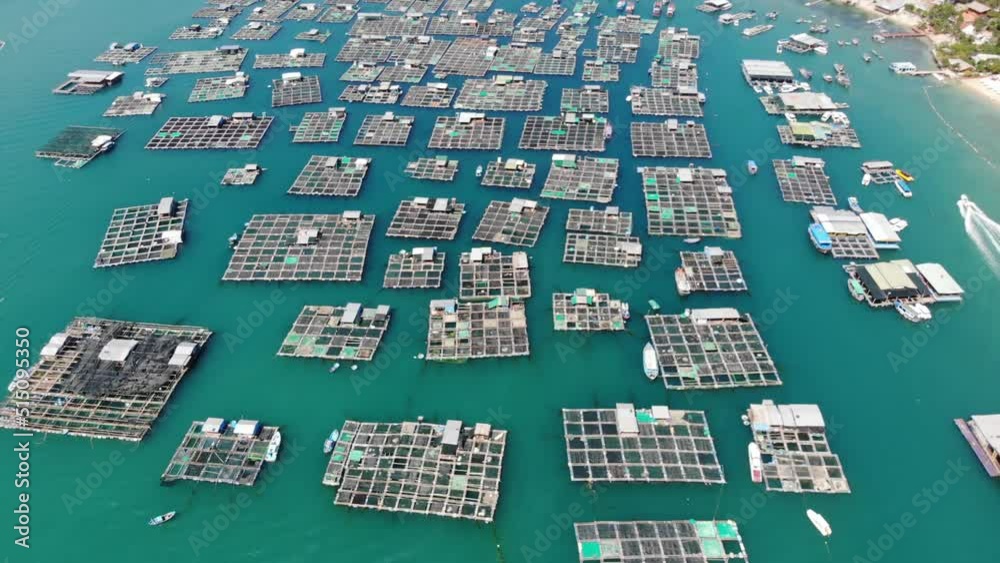 Aerial overview of fishing industry in Vietnam, fish farms in bay and scenic coastal. Nha Trang Aerial overview of fishing industry in Vietnam, fish farms in bay and scenic coastal. Nha Trang