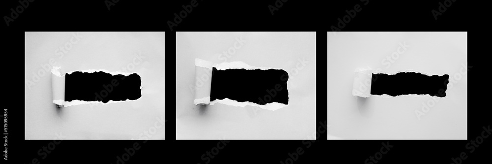 torn paper with the curled rolls ripped sides. a long black hole of ...