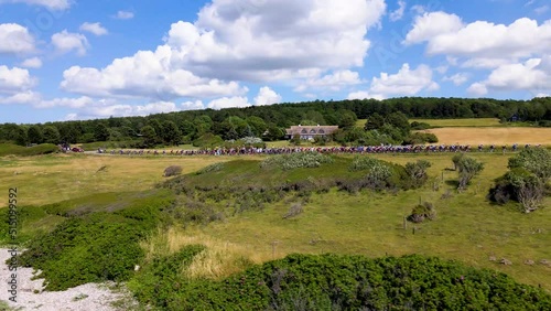 Tour de France 2022 stage 2 Cote de Karup Strandbakke. Aerial view of the peleton and Magnus Cort racing close to the beautiful coast and up the green hills. photo