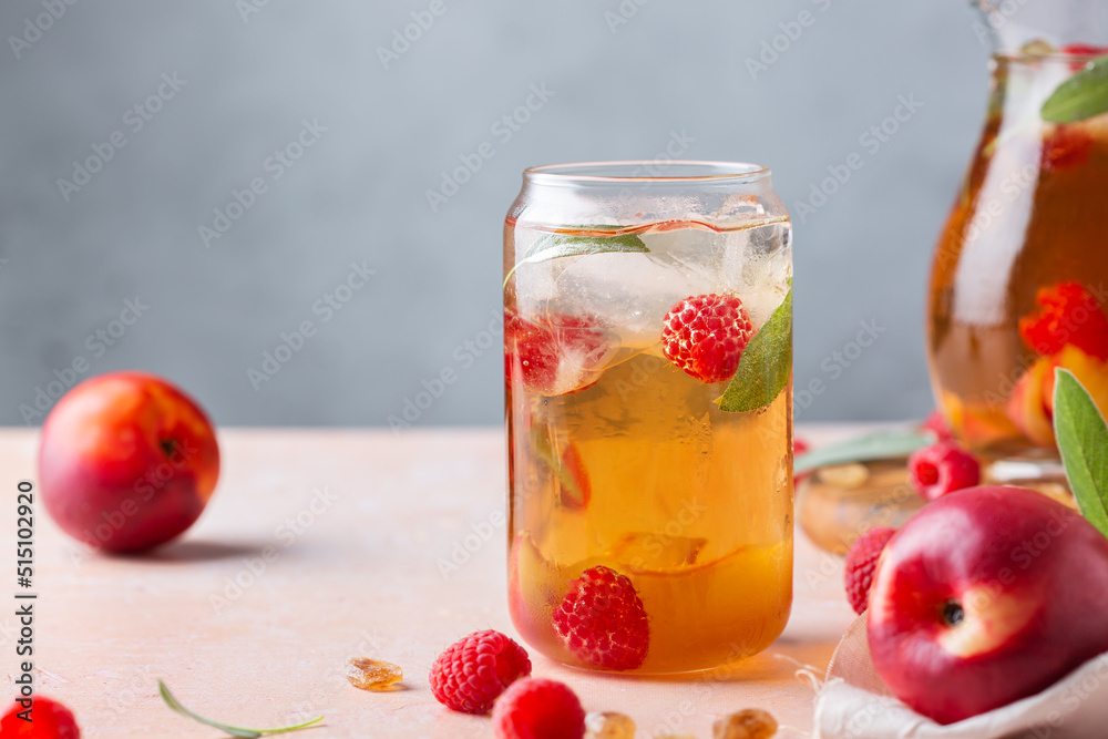 Peach raspberry iced tea, summer refreshing drink, beverage, cocktail Peach raspberry iced tea, summer refreshing drink, beverage, cocktail