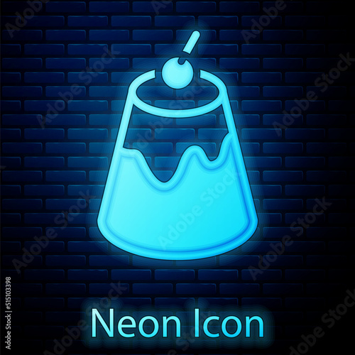 Glowing neon Pudding custard with caramel glaze icon isolated on brick wall background. Vector