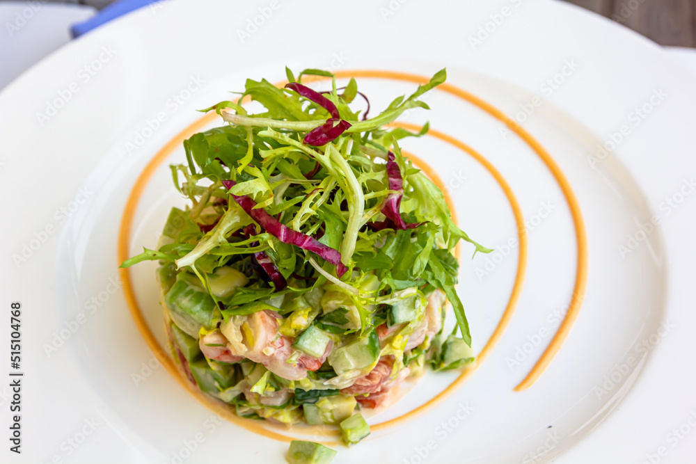Layer Salad with Shrimps, Crab and Avocado in Luxury Restaurant Layer Salad with Shrimps, Crab and Avocado in Luxury Restaurant